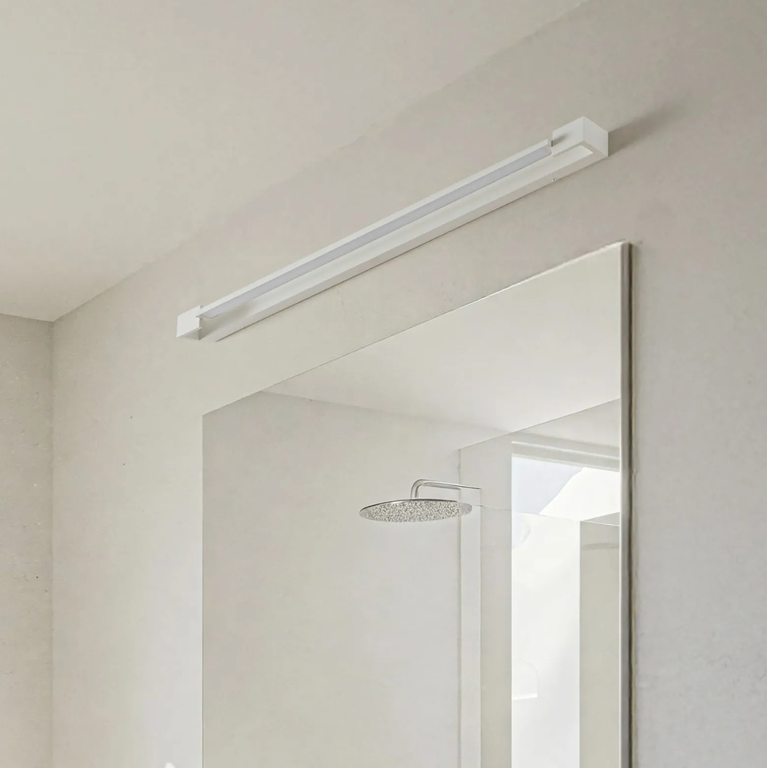 Arcchio LED-seinävalaisin Jora, 90 cm, valkoinen, kääntyvä, IP44