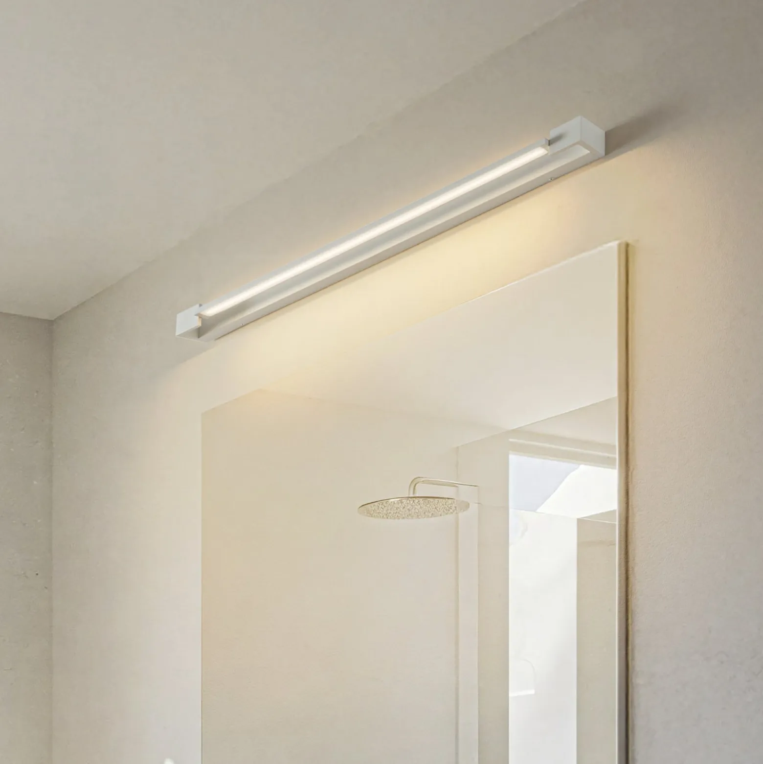 Arcchio LED-seinävalaisin Jora, 90 cm, valkoinen, kääntyvä, IP44