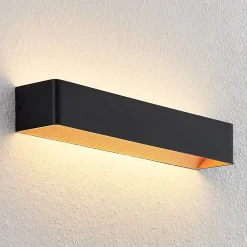Arcchio LED-seinävalaisin Karam, 53 cm, musta, metalli, ylös/alas