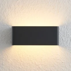 Arcchio LED-seinävalaisin Karam, 20 cm, musta, metalli, ylös/alas -valaisin