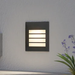 Arcchio LED upotettava seinävalaisin Zamo, rasteri, musta, IP65
