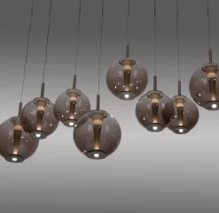 LED-riippuvalaisin PURE E-Infinity, pronssi/keltainen, 198 cm, 10-lamppuinen