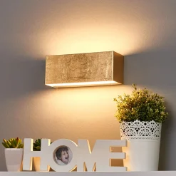 Lindby LED-seinävalaisin Quentin, 23cm leveä, kullanvärinen, metallia