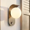 Lindby LED-ulkoseinävalaisin Lacie, sensori, musta/valkoinen, alumiini