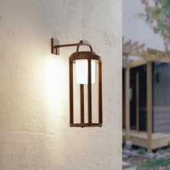 Lucande 2-in-1 LED-aurinkokäyttöinen seinävalaisin Tilena, ruoste, pyöreä,