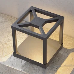 Lucande LED jalkalamppu Lealan, musta, metalli, 23 cm, IP54