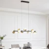 Lucande LED-riippuvalaisin Pallo, 7-lamppuinen, musta/kulta, lasi