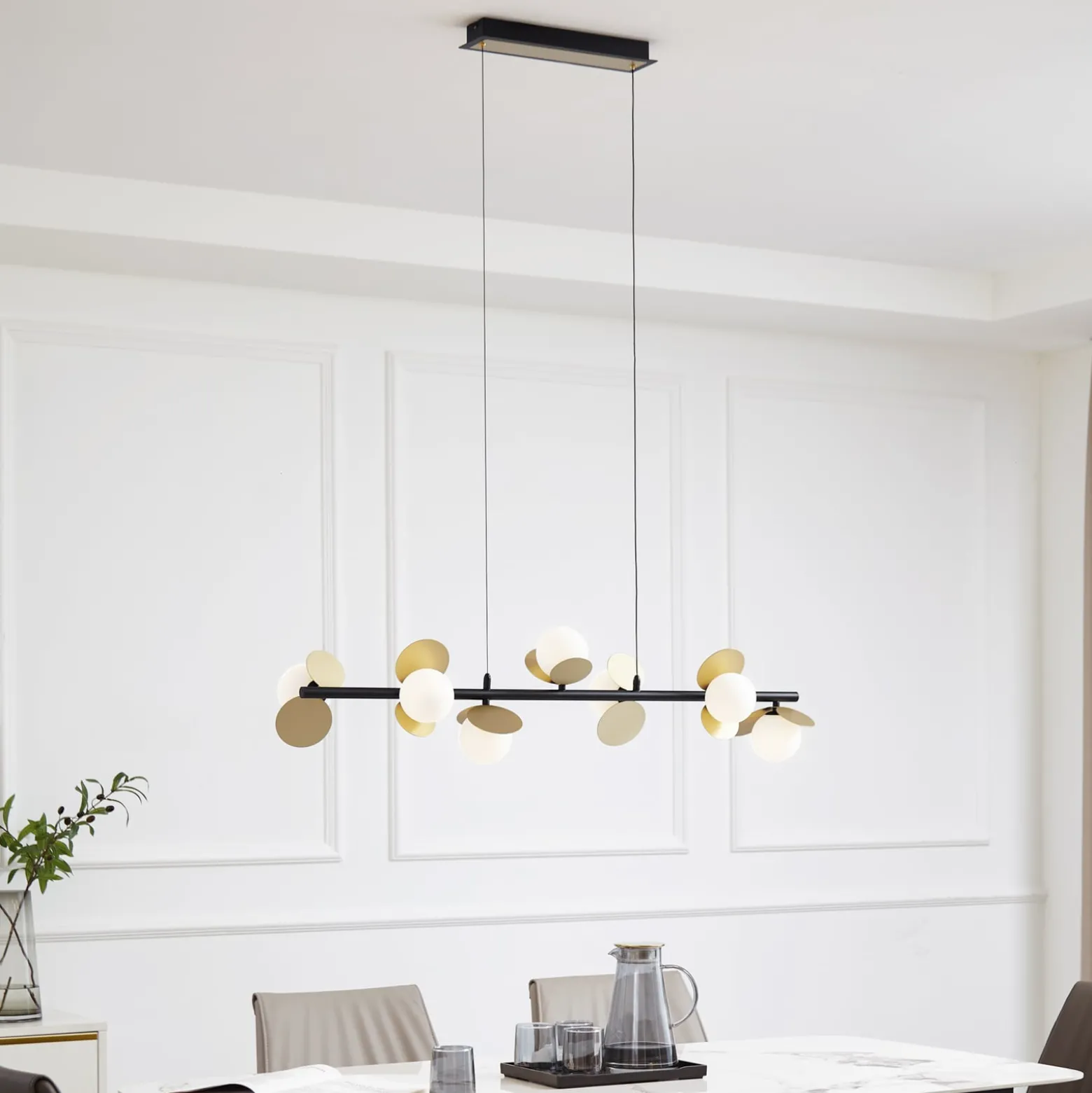 Lucande LED-riippuvalaisin Pallo, 7-lamppuinen, musta/kulta, lasi