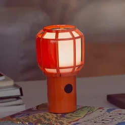 MARSET Chispa -LED-akkuterassilamppu IP44 oranssi