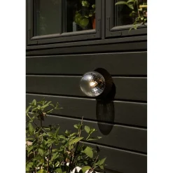 Nuura ulkoseinävalaisin Liila, Ø 16 cm, musta/kirkas