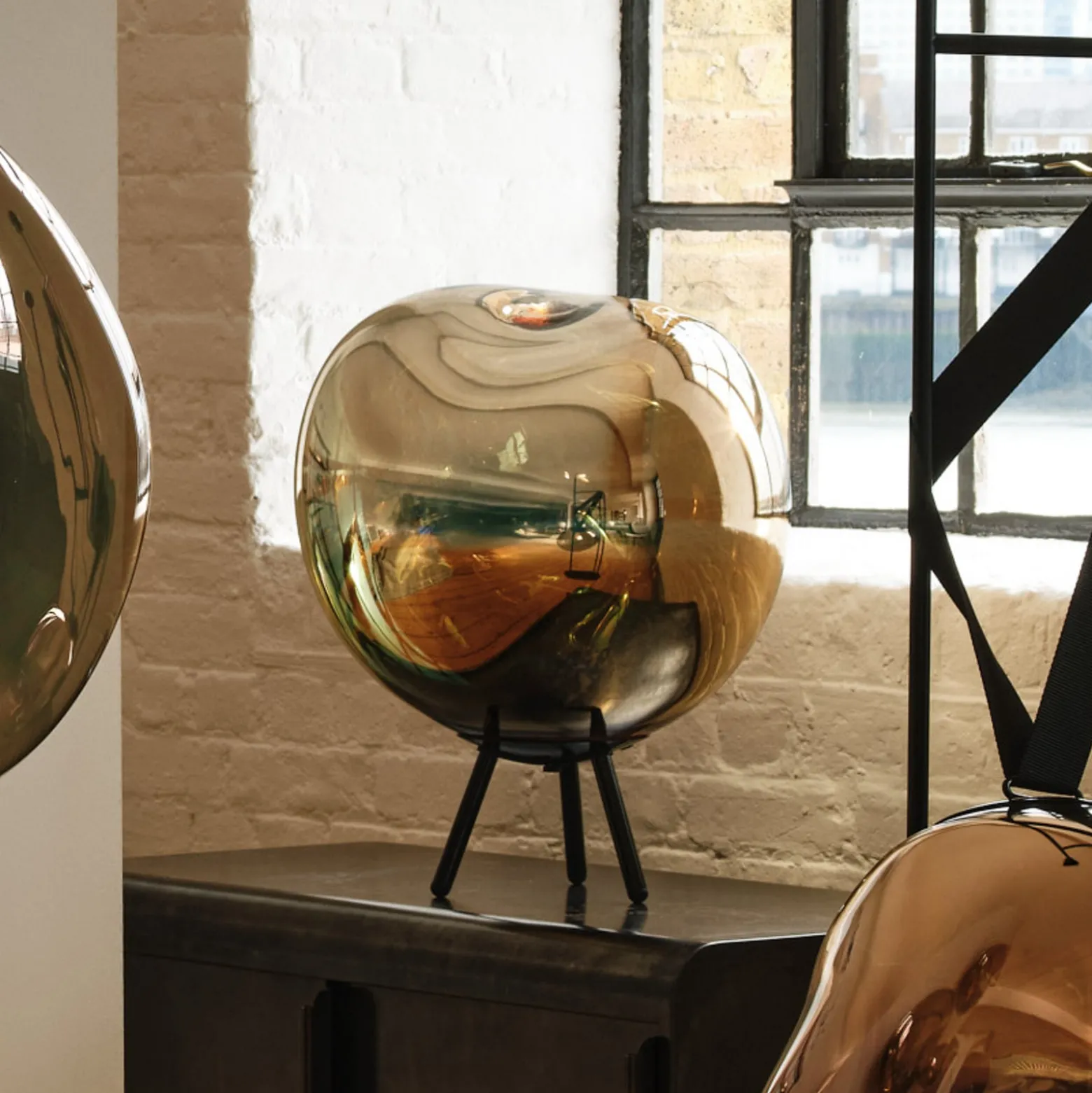 Tom Dixon LED-akkuinen terassilamppu Melt large, pronssinvärinen