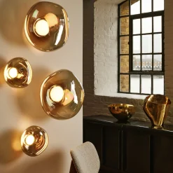 Tom Dixon LED-seinävalaisin Melt, Ø 29 cm, pronssinvärinen