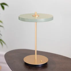 UMAGE LED-akkukäyttöinen pöytälamppu Asteria Move oliivinvihreä/messinki 31 cm