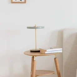 UMAGE LED-akkukäyttöinen pöytälamppu Asteria Move oliivinvihreä/messinki 31 cm