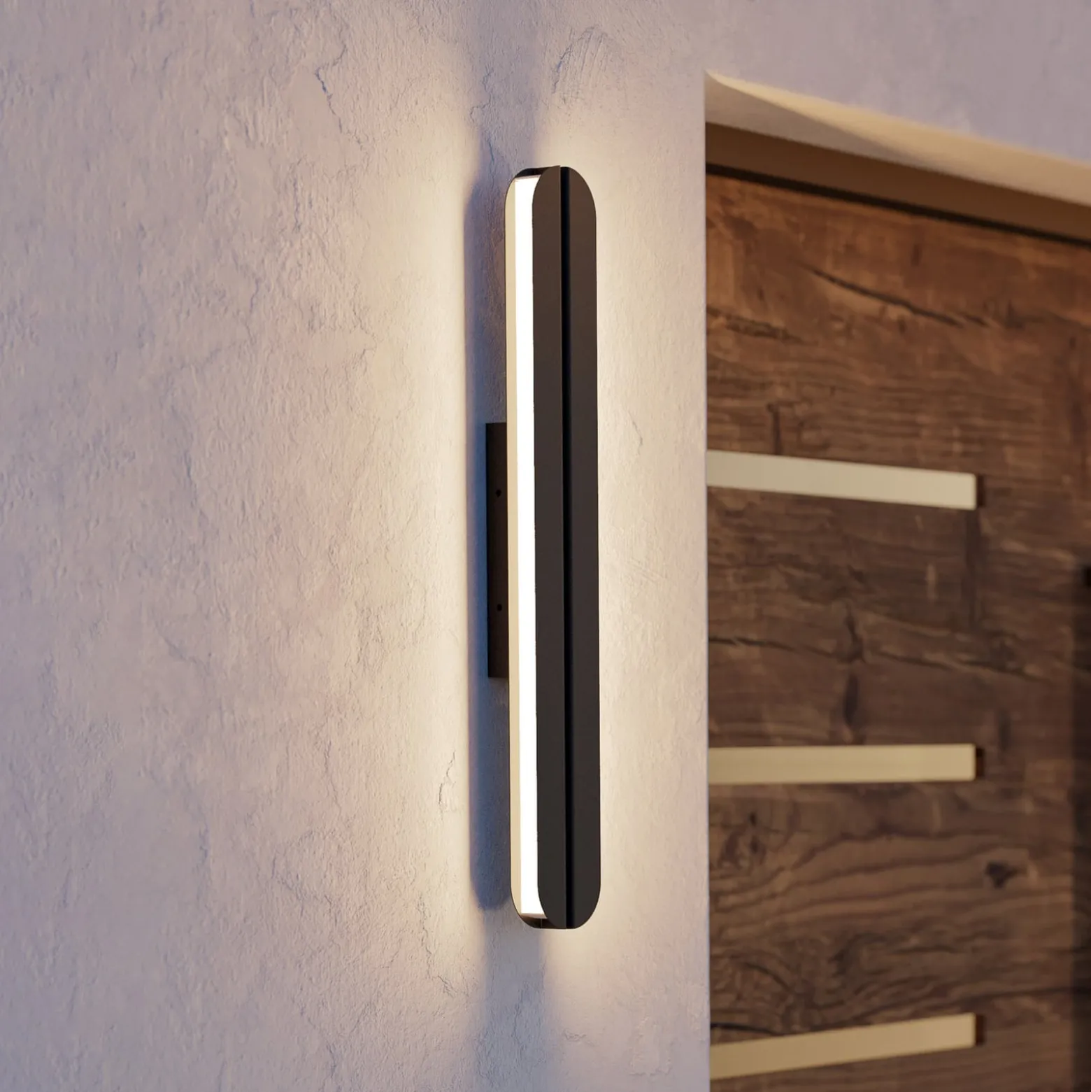 Vascella-LED-ulkoseinälamppu, musta, leveys 60 cm, metallia